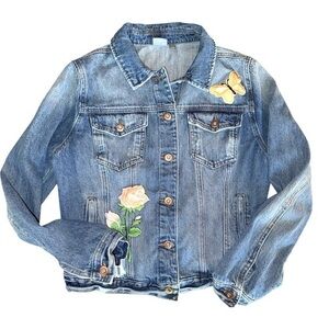 Distressed Denim Jacket with Patches. BUTTERFLY & FLOWER front flap pockets.